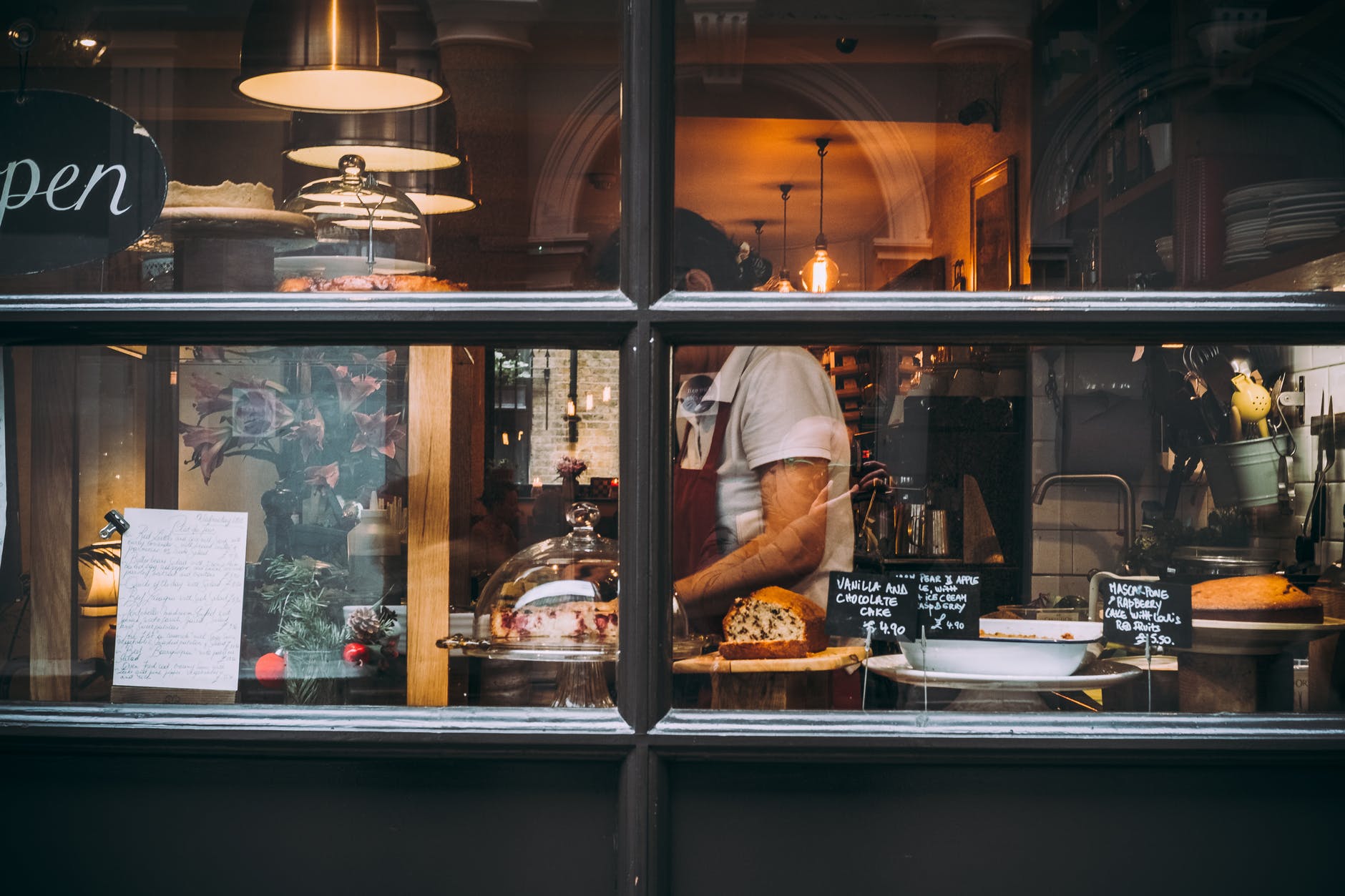 woman in restaurant wearing apron